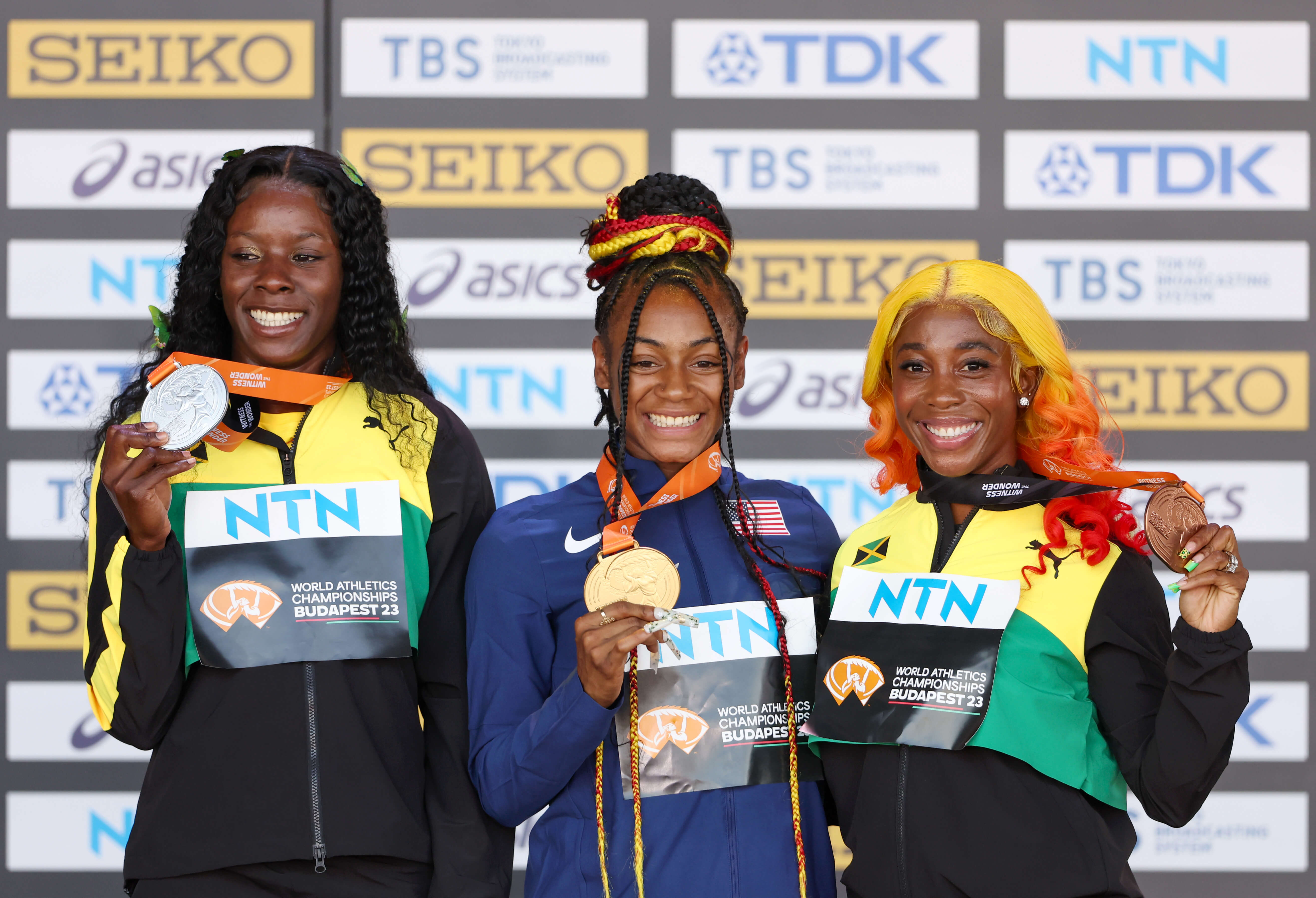WOMEN-S-100M-PODIUM